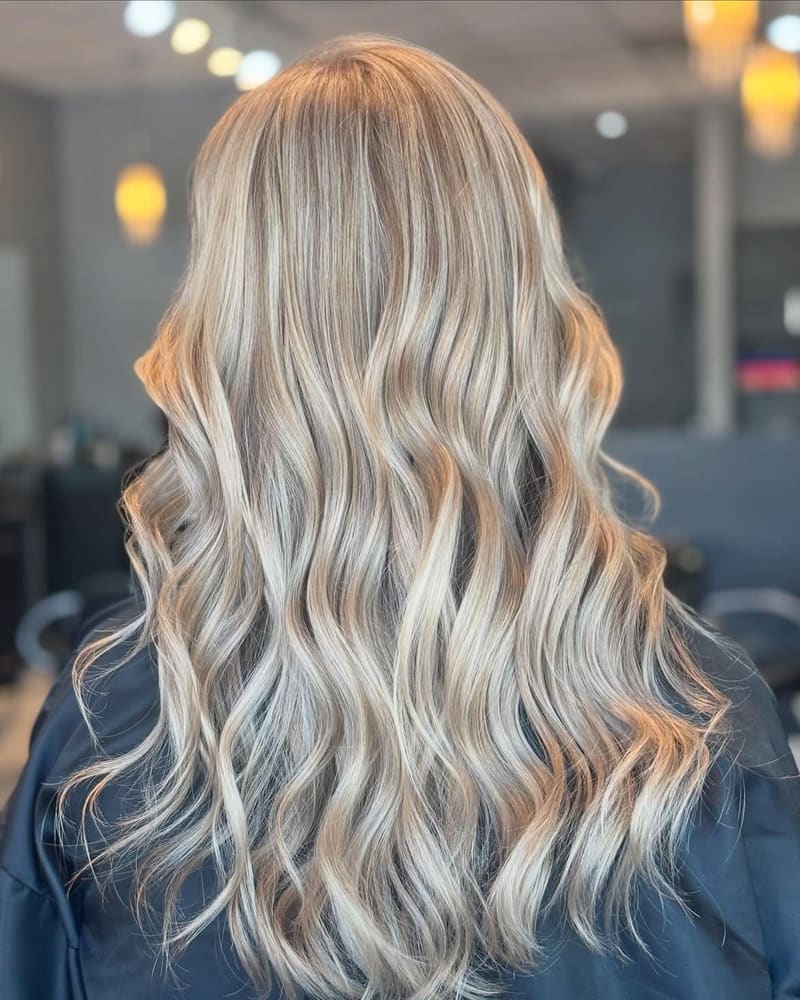 Blonding service by apprentice stylist AJ at Hairmix Salon